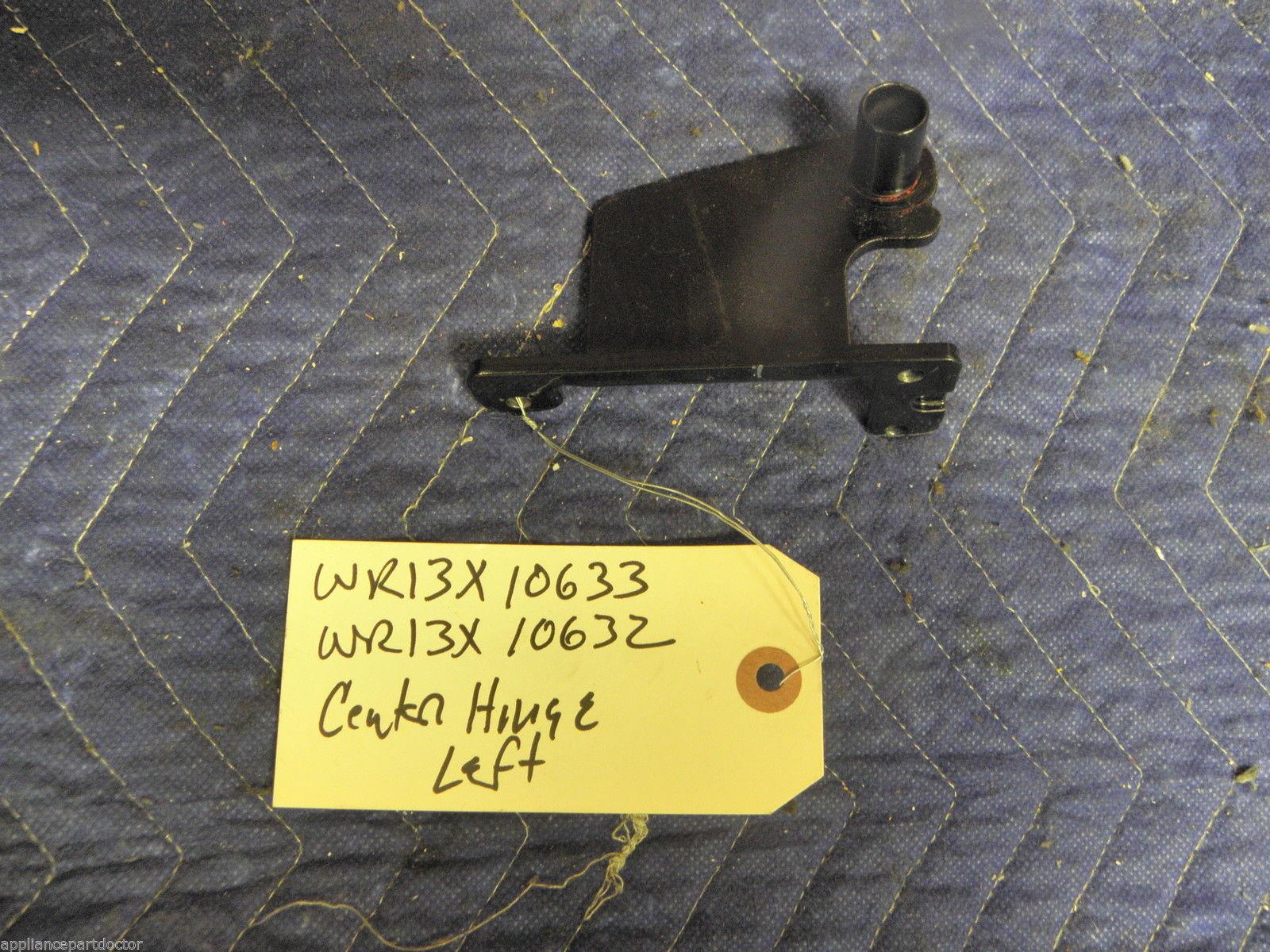 GE REFRIGERATOR WR13X10633 WR13X10632 CENTER HINGE & PIN LEFT USED PART ASSEMBLY GE REFRIGERATOR WR13X10633 WR13X10632 CENTER HINGE & PIN LEFT USED PART ASSEMBLY